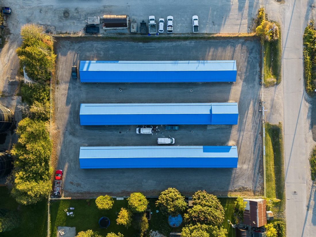 Aerial view of a self-storage facility with three rows of storage units